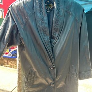 vintage leather coat. very well loved and worn.
